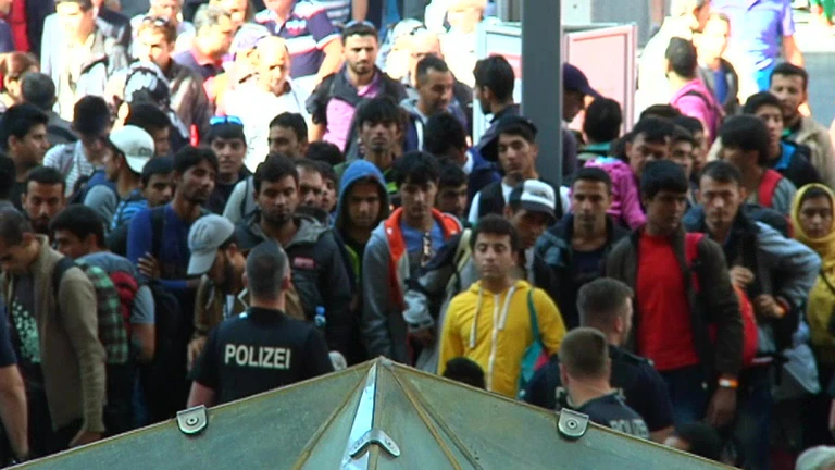 ankommende Flüchtlinge an der Bayerischen Grenze