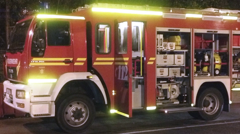 Ein Feuerwehrauto im Einsatz — © Symbolfoto