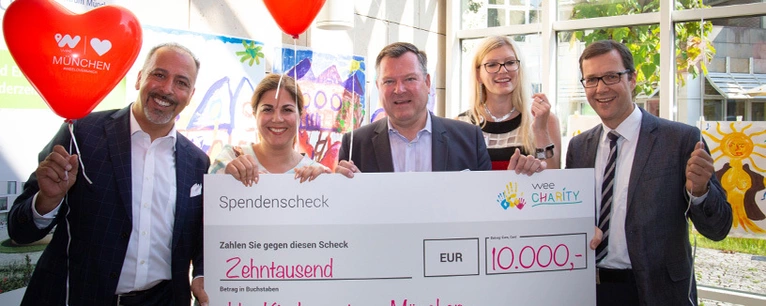 wee scheckübergabe an kbo kinderzentrum
